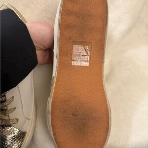 Dolce Vita Gold and Cream Sneakers